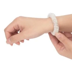 KIKKERLAND Acupressure Rings Set -Kikkerland acupressure rings set action shot
