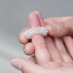 KIKKERLAND Acupressure Rings Set -Kikkerland acupressure rings set in use