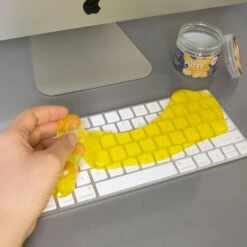 KIKKERLAND Cleaning Putty -Kikkerland cleaning putty being used