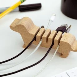 KIKKERLAND Dog Multi Cord Holder -Kikkerland dog multi cord holder on table