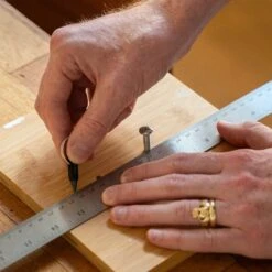 KIKKERLAND Everlasting Pencil Keychain -Kikkerland everlasting pencil keychain being used with ruler