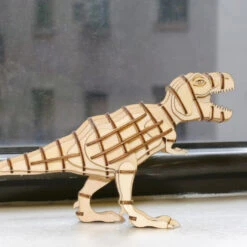 KIKKERLAND T-Rex 3D Wooden Puzzle -Kikkerland t rex 3d wooden puzzle on table