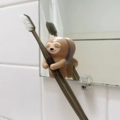 KIKKERLAND Sloth Toothbrush Holder -Kikkerland Sloth Toothbrush Holder In Use